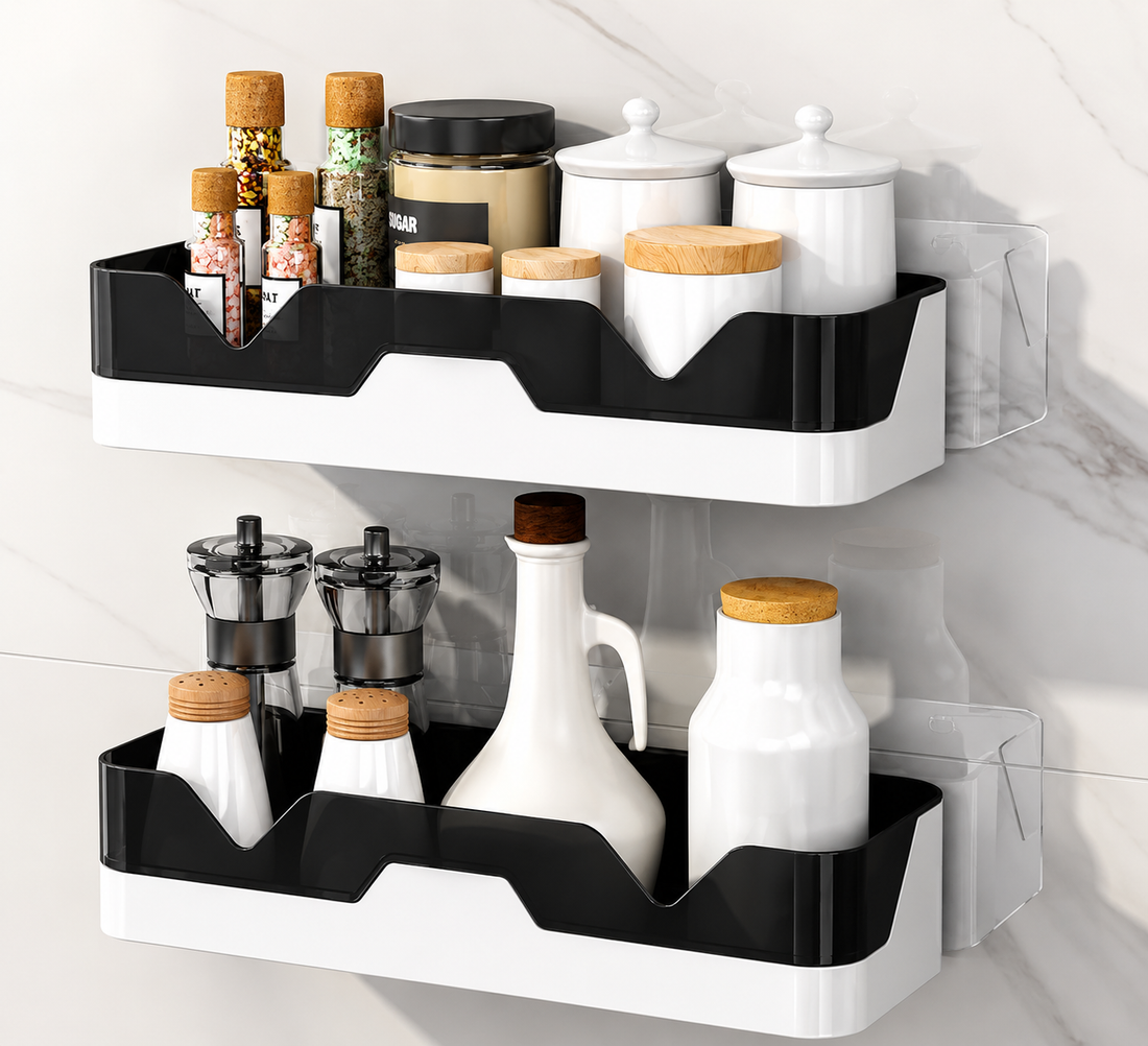 Two-tier wall-mounted spice and condiment organizers in black and white, shown holding jars, bottles, and containers against a light marble wall.